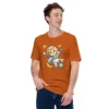 Astronaut cat t-shirt featuring a cute orange tabby in a spacesuit floating in space